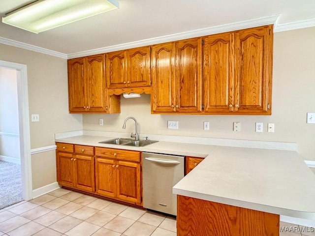 kitchen with a sink, light countertops, brown cabinets, a peninsula, and stainless steel dishwasher