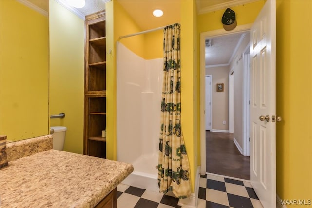 full bath featuring tile patterned floors, visible vents, ornamental molding, a shower stall, and baseboards