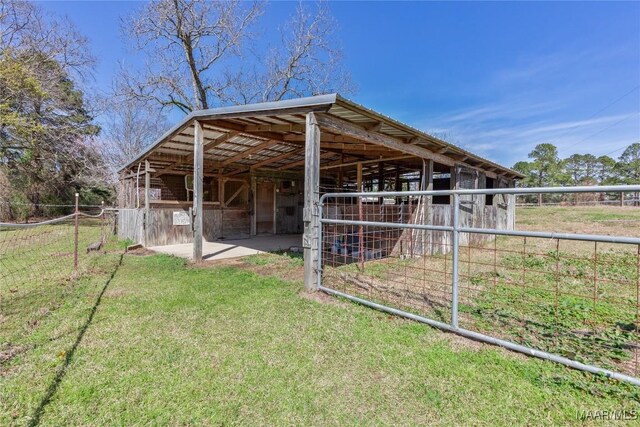 view of outbuilding featuring an outbuilding and an exterior structure