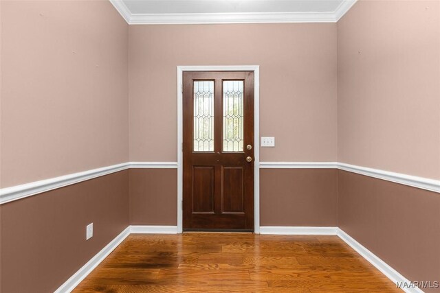 125 Greenfield Pl, Wetumpka, AL 36093 - entrance foyer featuring baseboards, wood finished floors, and ornamental molding