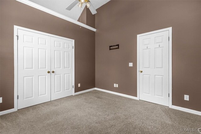 125 Greenfield Pl, Wetumpka, AL 36093 - unfurnished bedroom featuring baseboards, carpet floors, and high vaulted ceiling