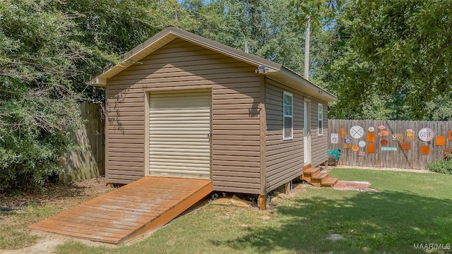 125 Greenfield Pl, Wetumpka, AL 36093 - view of outbuilding with a fenced backyard and an outdoor structure