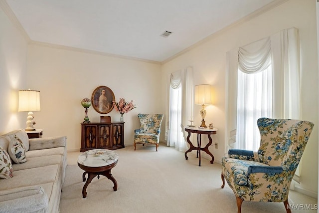 carpeted living area with visible vents and crown molding