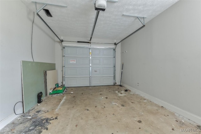 garage featuring baseboards