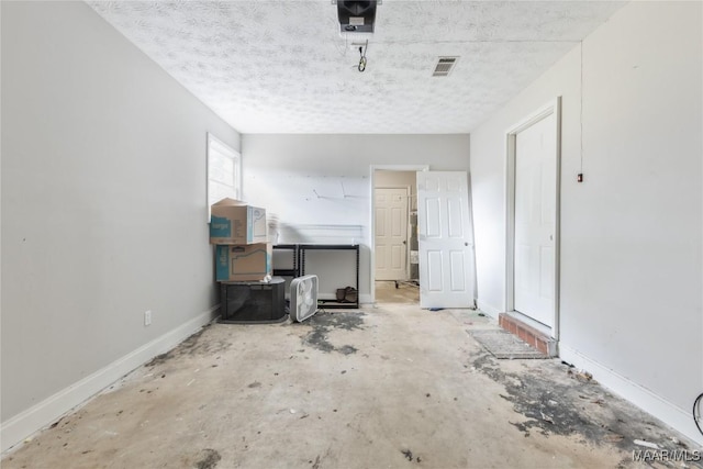 interior space featuring visible vents and baseboards