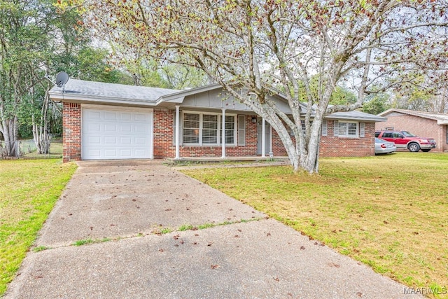 ranch-style house featuring a garage, a front lawn, brick siding, and driveway