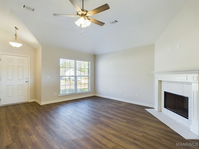 unfurnished living room featuring dark wood finished floors, baseboards, and visible vents