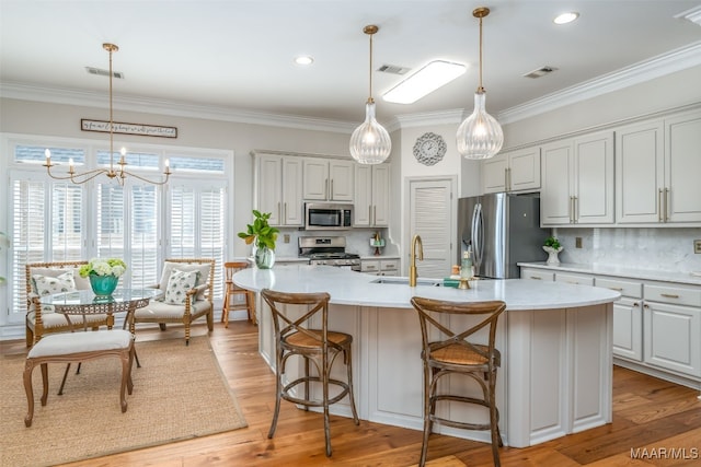 kitchen with a sink, visible vents, and appliances with stainless steel finishes