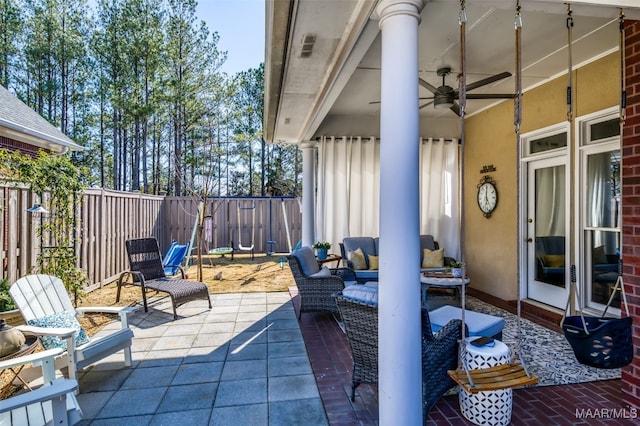 view of patio / terrace featuring a ceiling fan and a fenced backyard