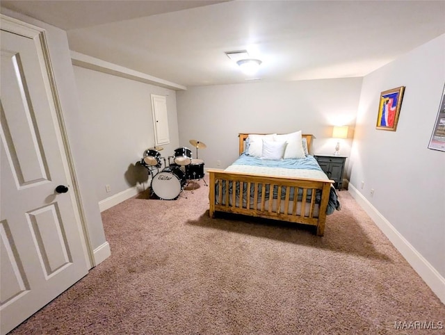 carpeted bedroom featuring baseboards