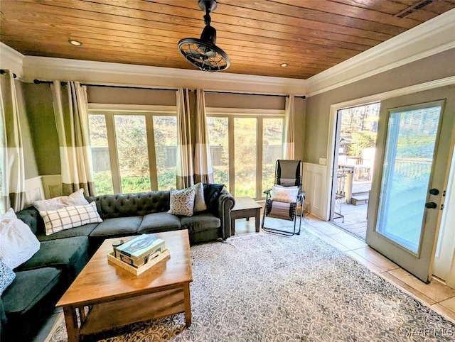 living room with wooden ceiling, light tile patterned floors, a wealth of natural light, and ornamental molding