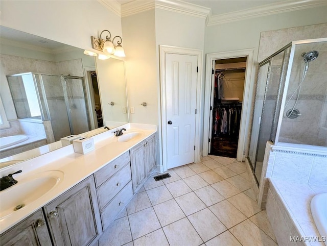 full bath with a sink, a stall shower, and ornamental molding