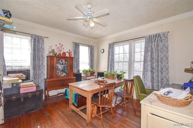 141 S Central Ave, Alexander City, AL 35010 - dining area with a textured ceiling, crown molding, ceiling fan, and hardwood / wood-style floors