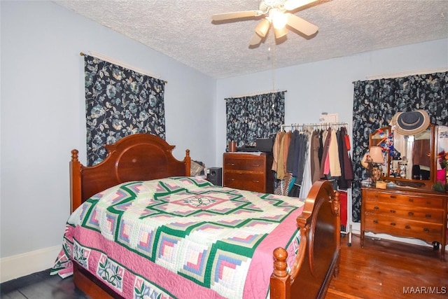 141 S Central Ave, Alexander City, AL 35010 - bedroom with ceiling fan, wood finished floors, and a textured ceiling