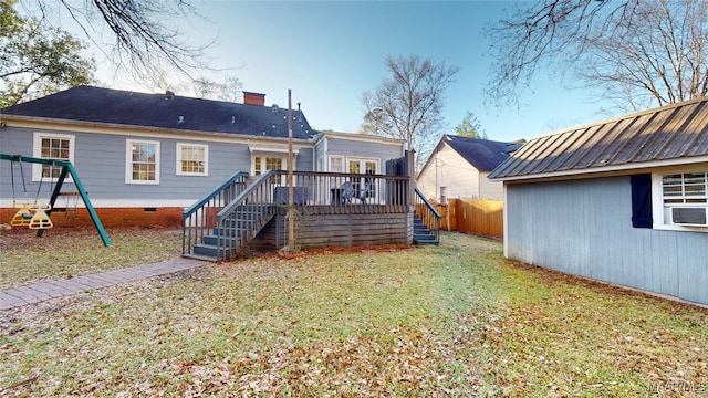 rear view of property with cooling unit, fence, a yard, a chimney, and a deck