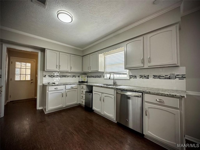 kitchen featuring light stone counters, dark wood-style floors, visible vents, a sink, and dishwasher