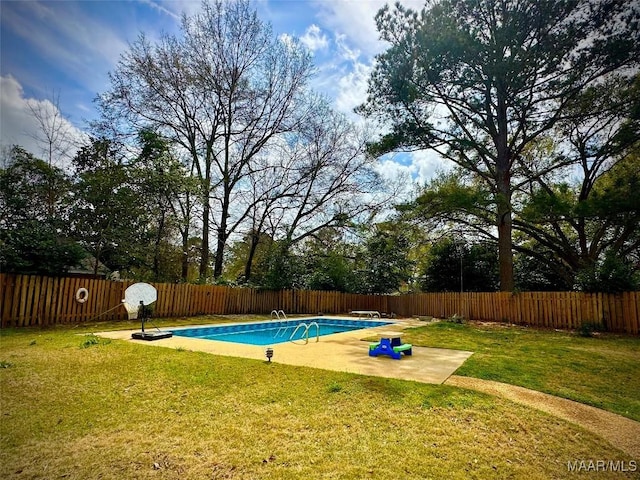 view of pool with a fenced in pool, a lawn, a fenced backyard, a patio, and a diving board