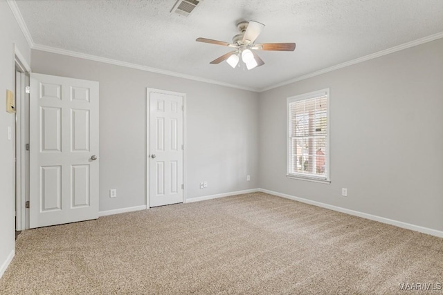 29 Creek Dr, Montgomery, AL 36117 - unfurnished bedroom with crown molding, baseboards, carpet floors, and a textured ceiling