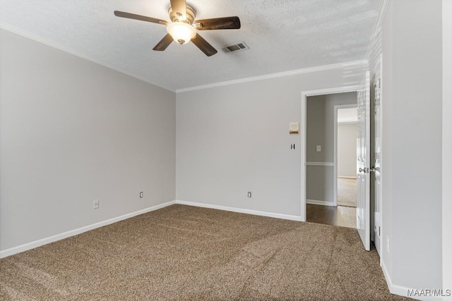 29 Creek Dr, Montgomery, AL 36117 - spare room with visible vents, ceiling fan, ornamental molding, carpet floors, and a textured ceiling