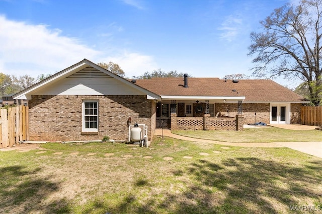 29 Creek Dr, Montgomery, AL 36117 - back of house featuring a lawn, french doors, and fence
