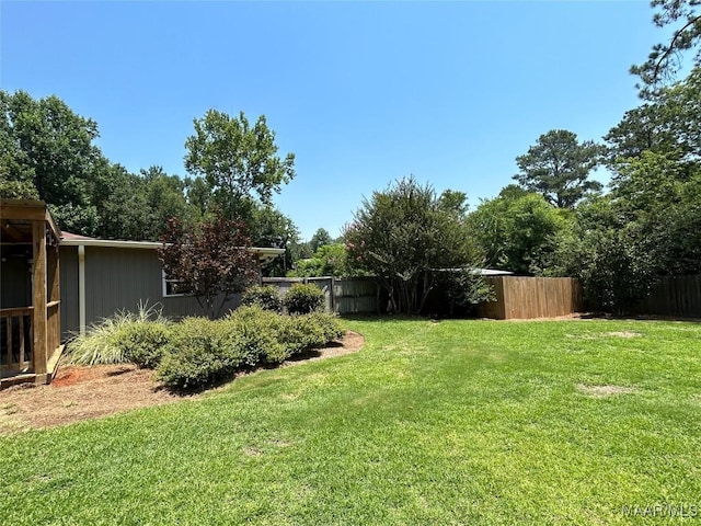 view of yard with fence