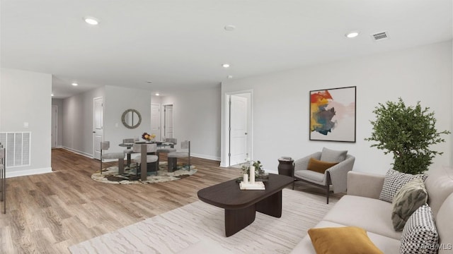 3140 Knotts Dr, Montgomery, AL 36116 - living area featuring light wood finished floors and recessed lighting