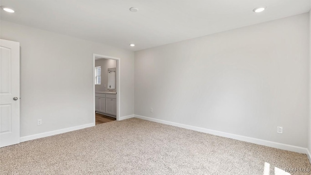 3140 Knotts Dr, Montgomery, AL 36116 - unfurnished bedroom featuring carpet, recessed lighting, and ensuite bath