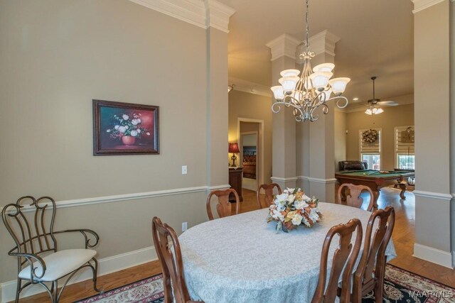 dining room featuring ceiling fan with notable chandelier, billiards, baseboards, and wood finished floors