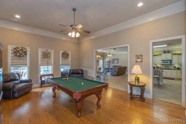 playroom with light wood finished floors, visible vents, ceiling fan, ornamental molding, and billiards