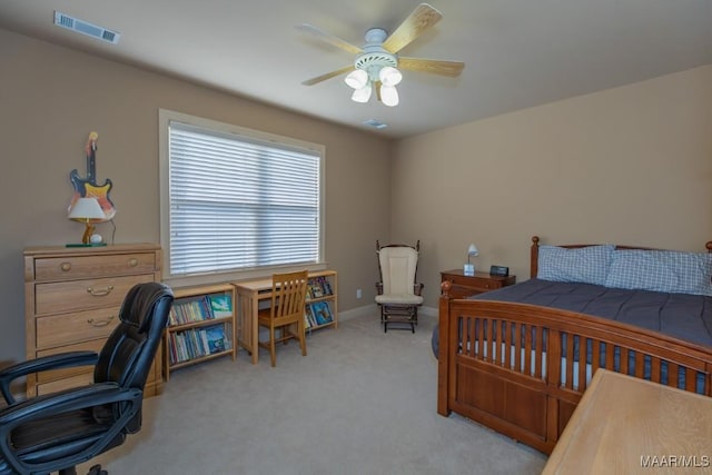 bedroom with visible vents, baseboards, carpet, and a ceiling fan