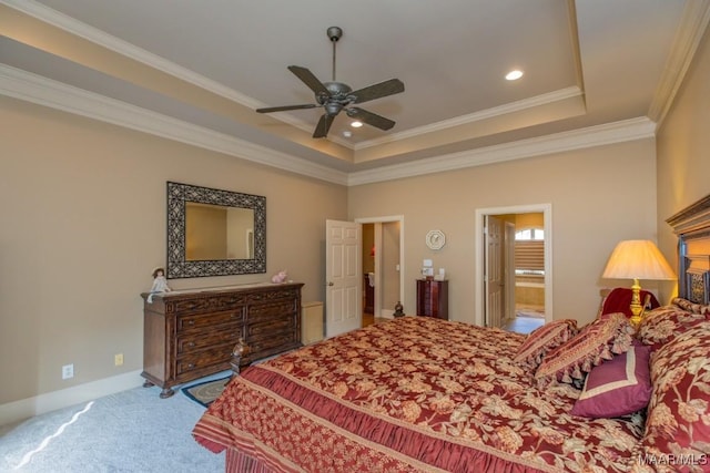 carpeted bedroom with recessed lighting, a raised ceiling, baseboards, and ornamental molding