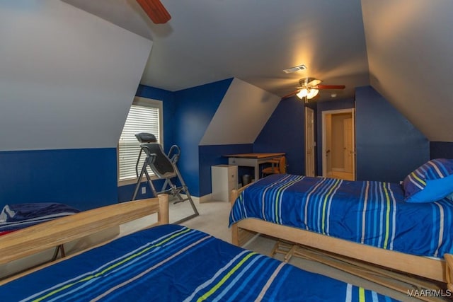 bedroom featuring visible vents, carpet flooring, ceiling fan, and vaulted ceiling