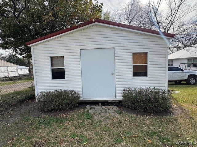 view of outdoor structure with an outdoor structure and fence