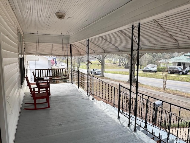 deck featuring covered porch