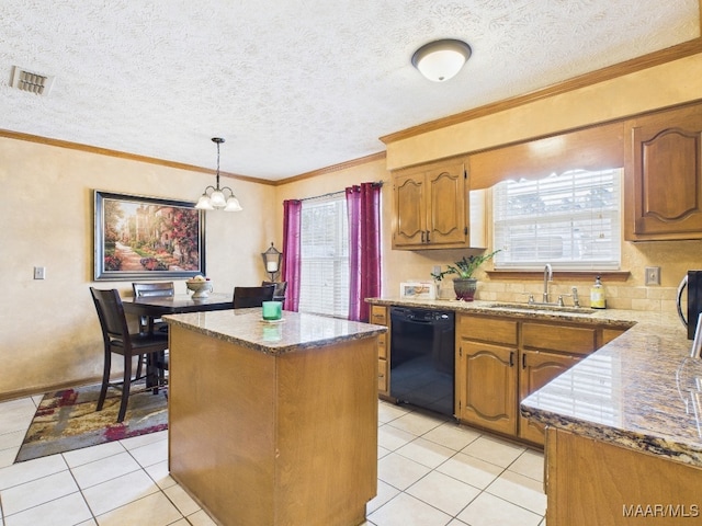 kitchen featuring visible vents, a kitchen island, dishwasher, a notable chandelier, and a sink