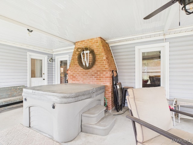 view of patio with a hot tub