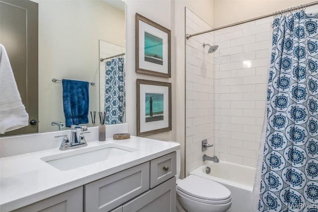 full bathroom featuring toilet, vanity, and shower / tub combo