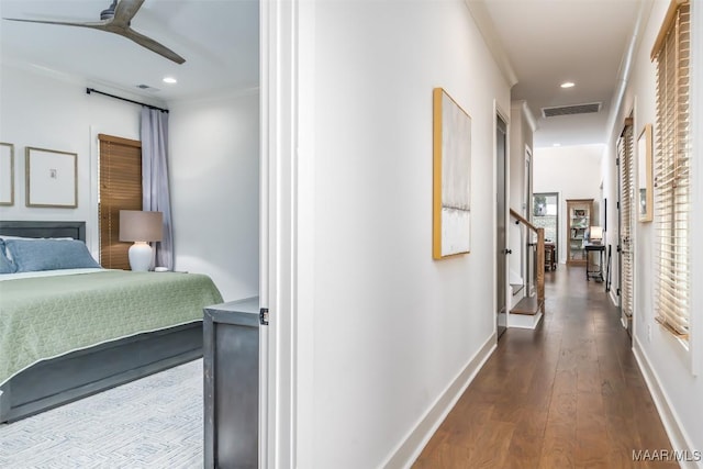 corridor with visible vents, dark wood-type flooring, recessed lighting, stairway, and baseboards