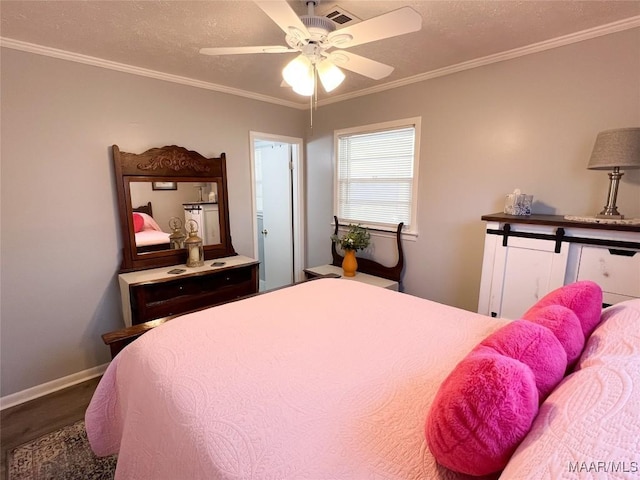 bedroom with a textured ceiling, a ceiling fan, baseboards, and ornamental molding