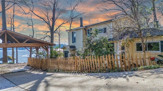 exterior space with a fenced front yard