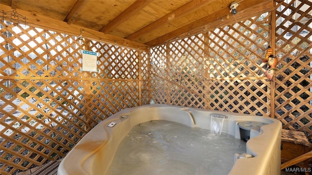 bathroom with beam ceiling