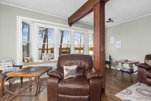 sunroom / solarium with beam ceiling and a healthy amount of sunlight