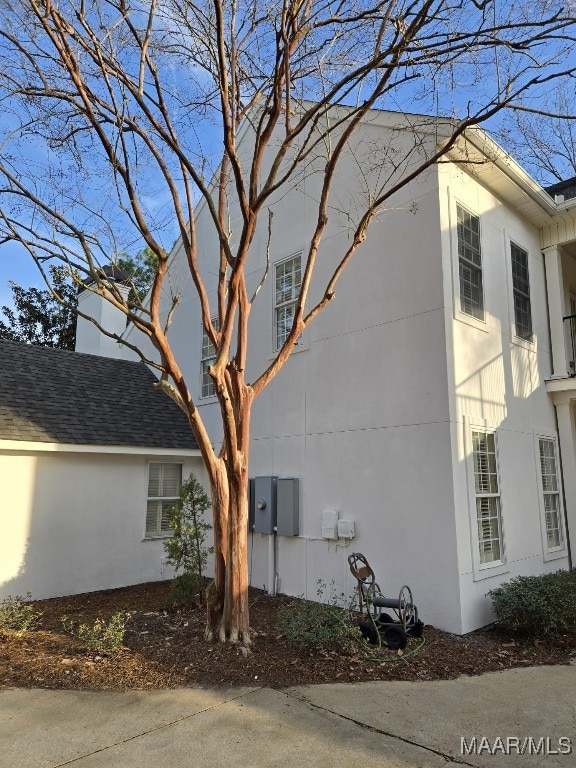 view of property exterior with stucco siding