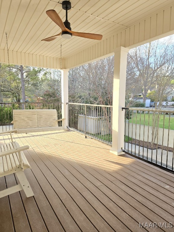 wooden terrace with ceiling fan