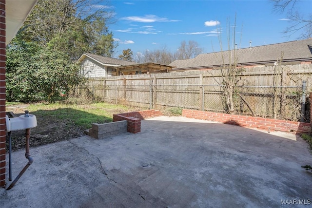 510 Ryan St, Montgomery, AL 36107 - fenced backyard featuring a patio area