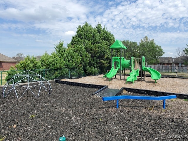 community jungle gym with fence