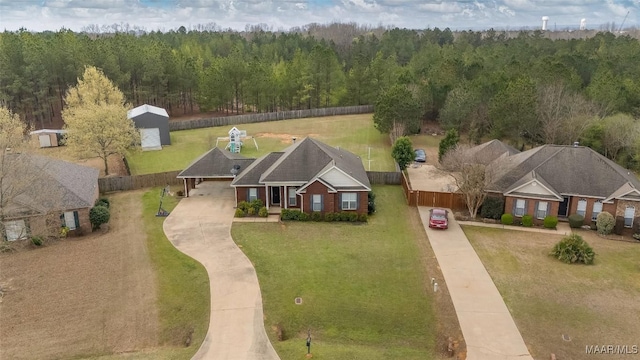 bird's eye view featuring a forest view