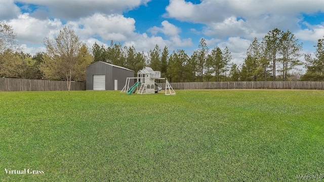 view of yard with an outdoor structure, a playground, and a fenced backyard