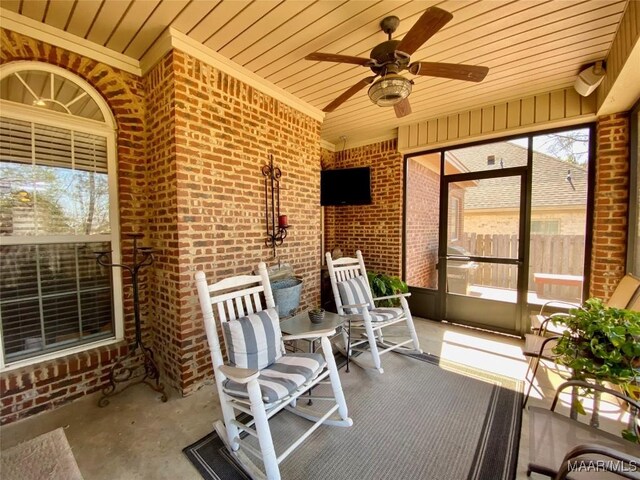view of patio / terrace with a porch and a ceiling fan