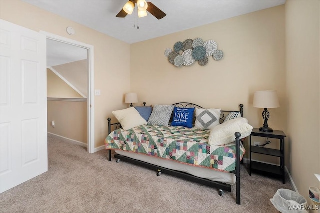 bedroom featuring carpet flooring, a ceiling fan, and baseboards